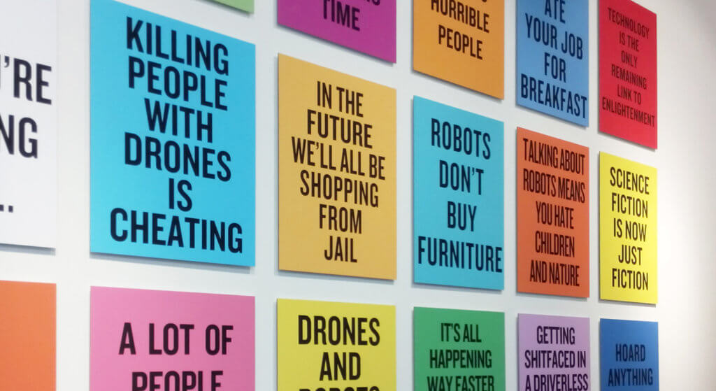 Wall with statements about humans and technology
